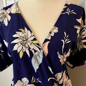 Navy blue floral faux wrap romper. Size 10